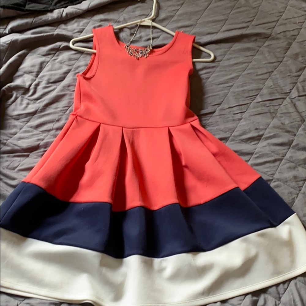Pink, navy, and white dress